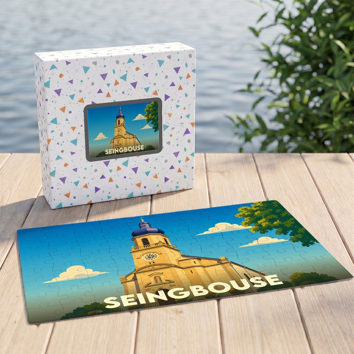 Puzzle souvenir de la ville de Seingbouse avec une illustration stylisée d'une église.