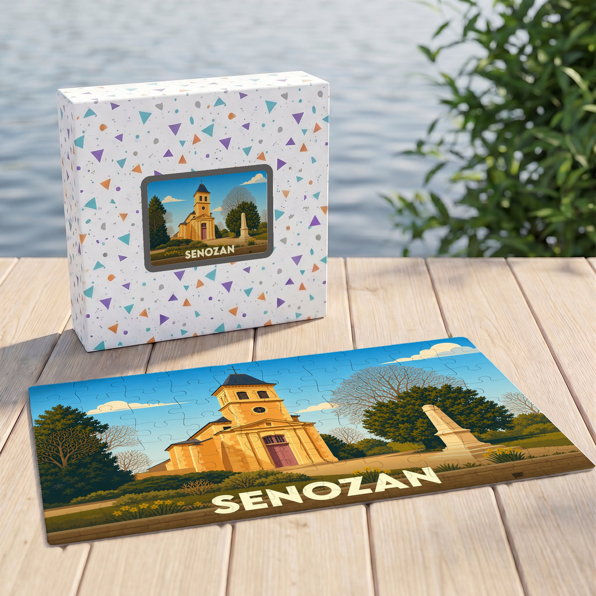 Puzzle souvenir de la ville de Senozan avec une illustration stylisée d'une église et son monument.