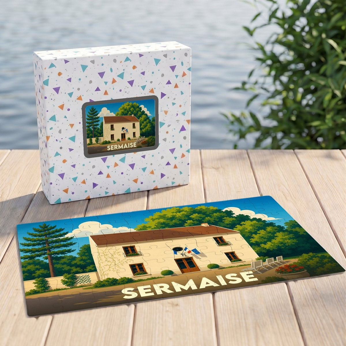 Puzzle souvenir de la ville de Sermaise présentant une illustration stylisée de sa mairie dans son coffret assorti.
