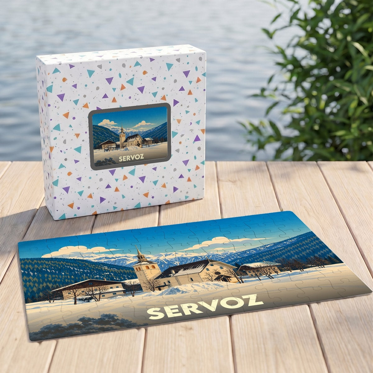 Puzzle souvenir de la ville de Servoz représentant un paysage de montagne enneigé avec son église.