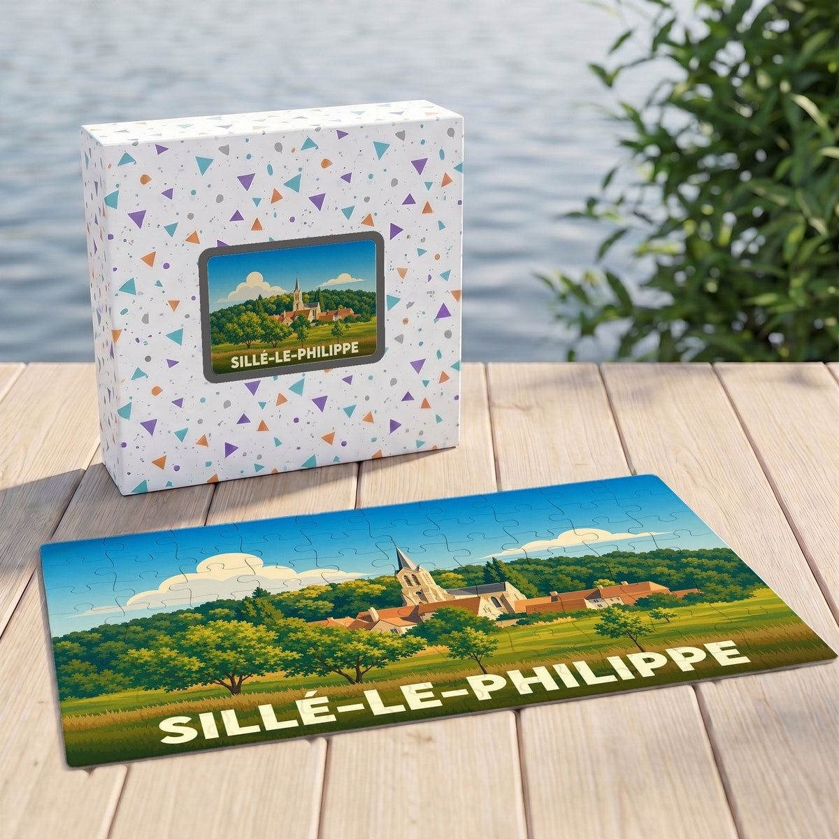 Puzzle souvenir de la ville de Sillé-le-Philippe avec une illustration stylisée de son église et de ses paysages.