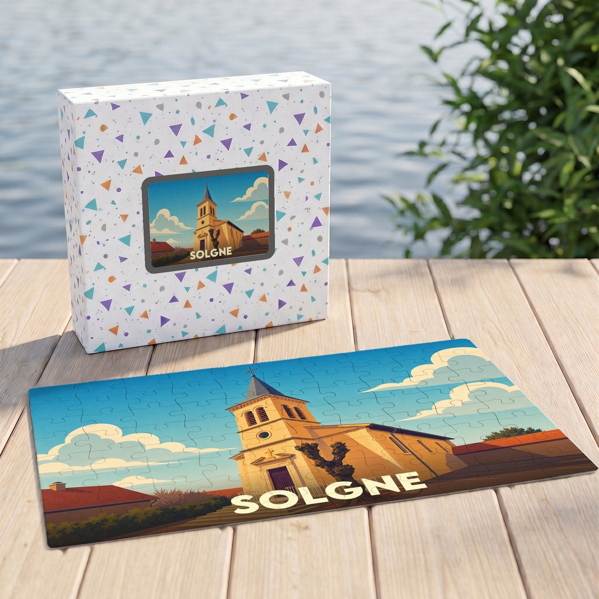 Puzzle souvenir de la ville de Solgne représentant une église sous un ciel azur.