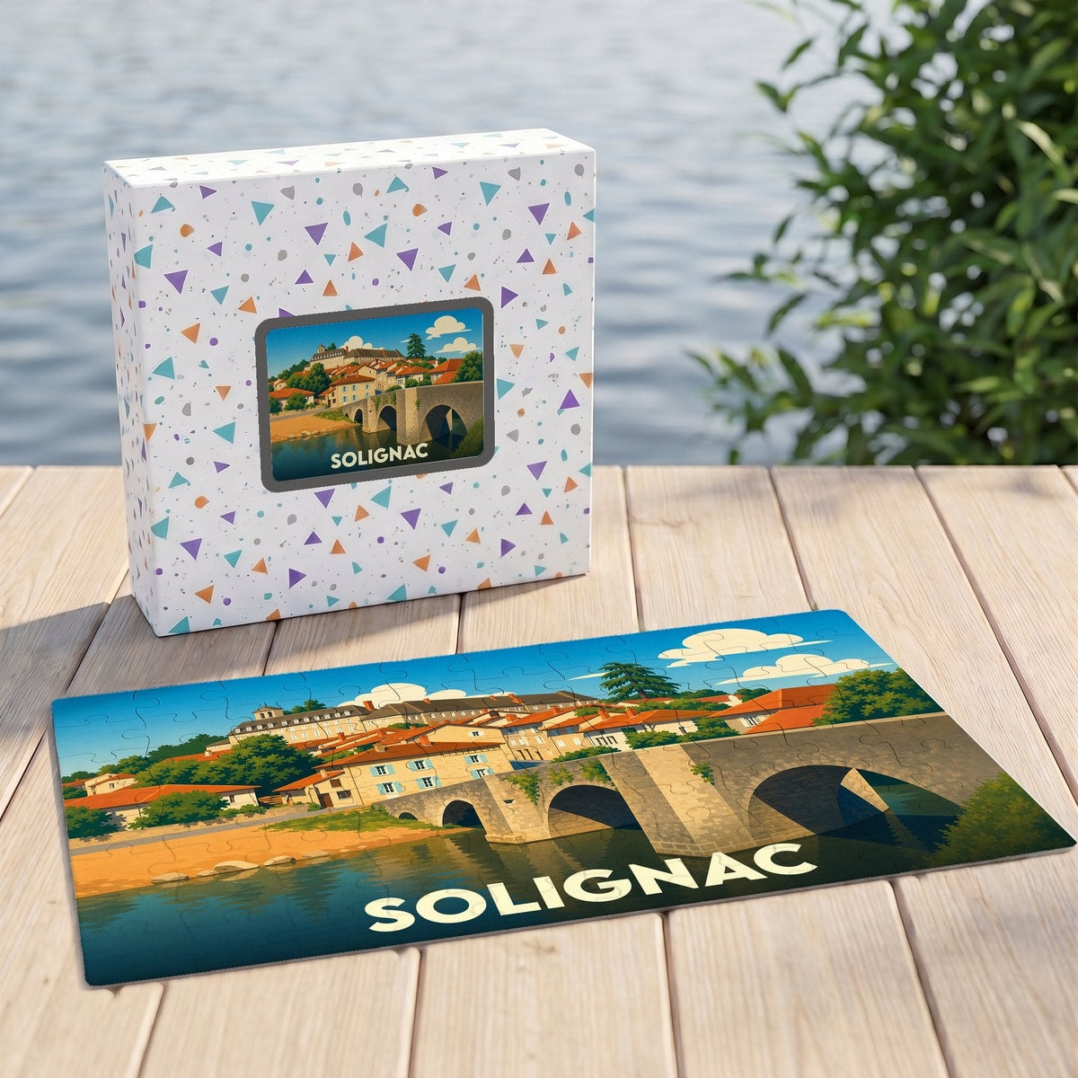 Puzzle souvenir de la ville de Solignac avec une illustration stylisée de son pont et de ses maisons anciennes.