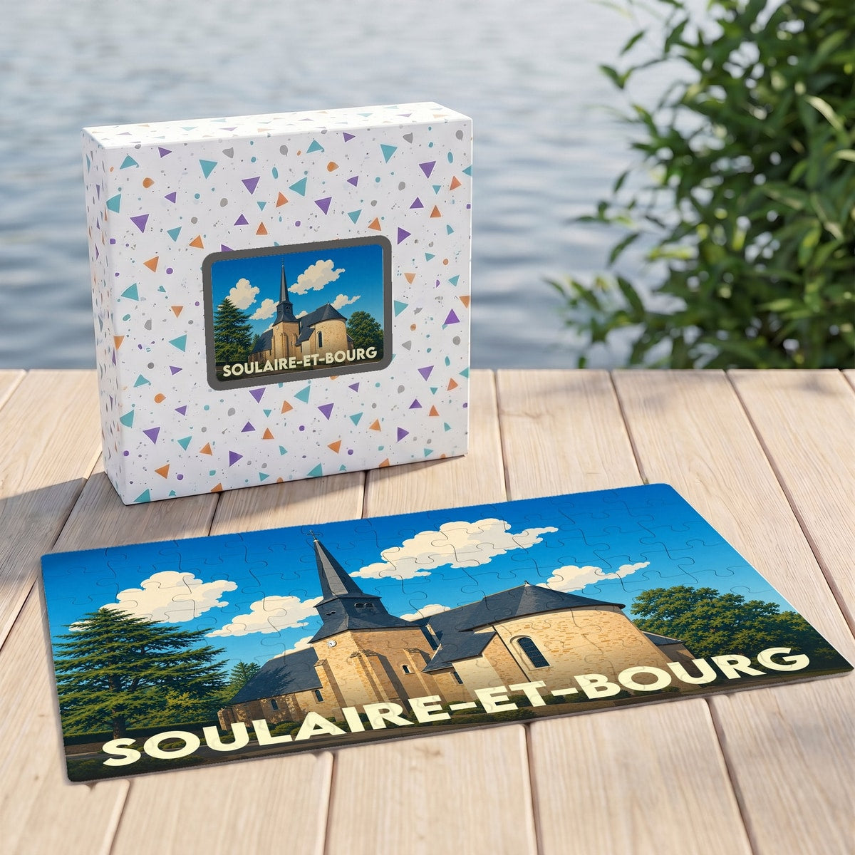 Puzzle souvenir de la ville de Soulaire-et-Bourg avec une illustration stylisée de son église et de son paysage.