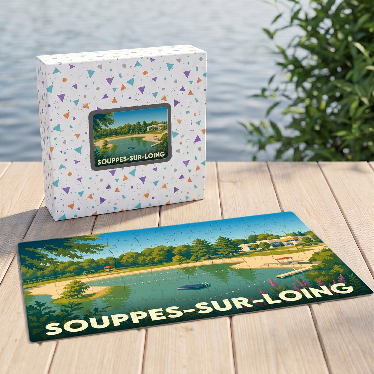 Puzzle souvenir de la ville de Souppes-sur-Loing avec une illustration stylisée de son plan d'eau.