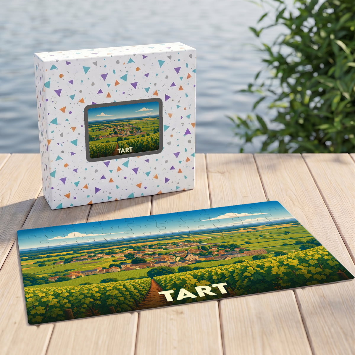 Puzzle souvenir de la ville de Tart avec une illustration de paysages de vignobles.