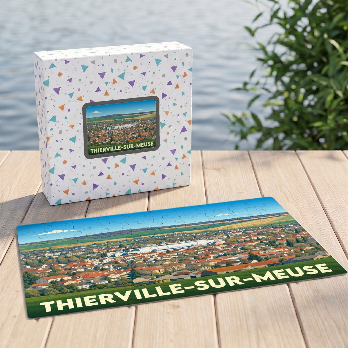Puzzle souvenir de la ville de Thierville-sur-Meuse avec une illustration panoramique stylisée.