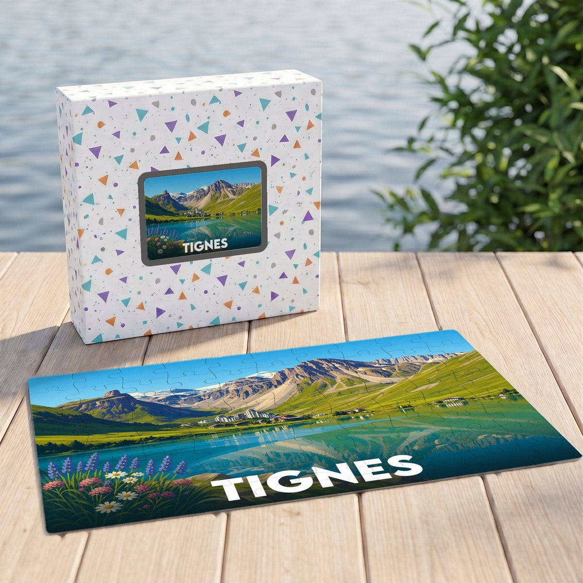 Puzzle souvenir de la ville de Tignes représentant un paysage alpin avec son lac et ses montagnes.