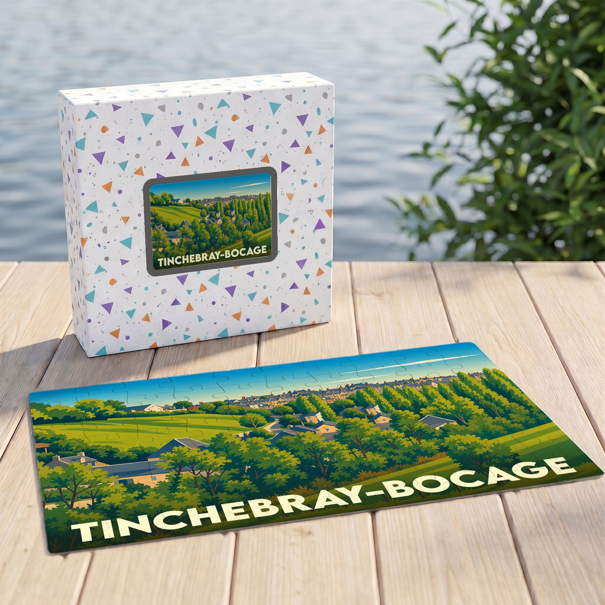 Puzzle souvenir de la ville de Tinchebray-Bocage avec une illustration de paysage champêtre.