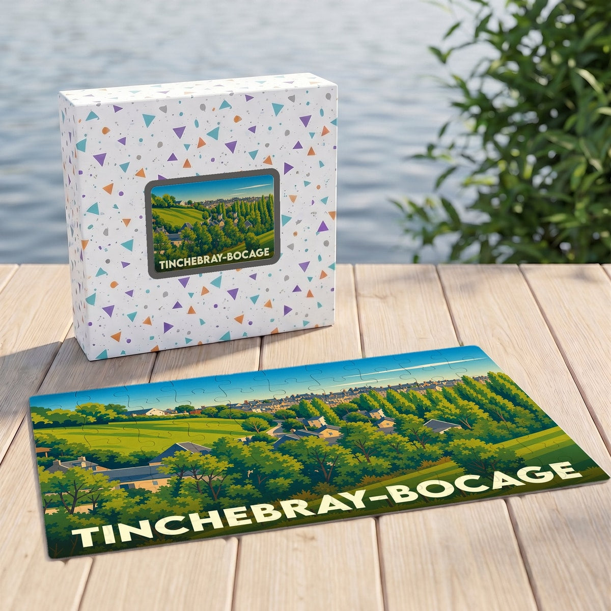 Puzzle souvenir de la ville de Tinchebray-Bocage avec une illustration de paysage verdoyant.