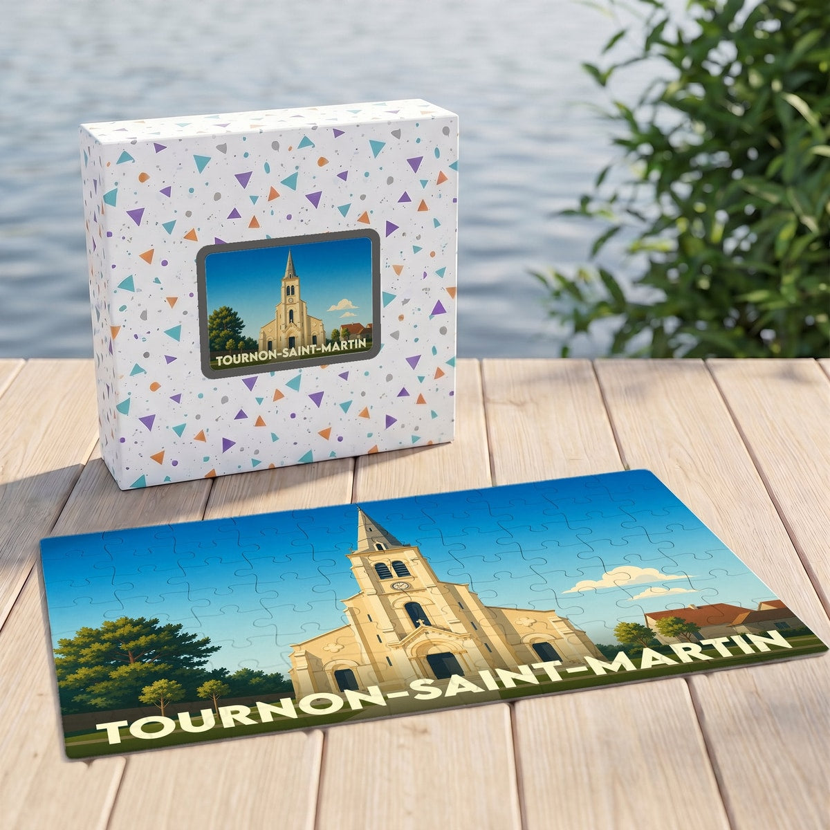 Puzzle souvenir de la ville de Tournon-Saint-Martin avec une illustration stylisée de son église.