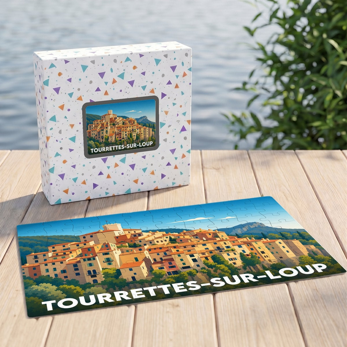 Puzzle souvenir de la ville de Tourrettes-sur-Loup avec une illustration stylisée.