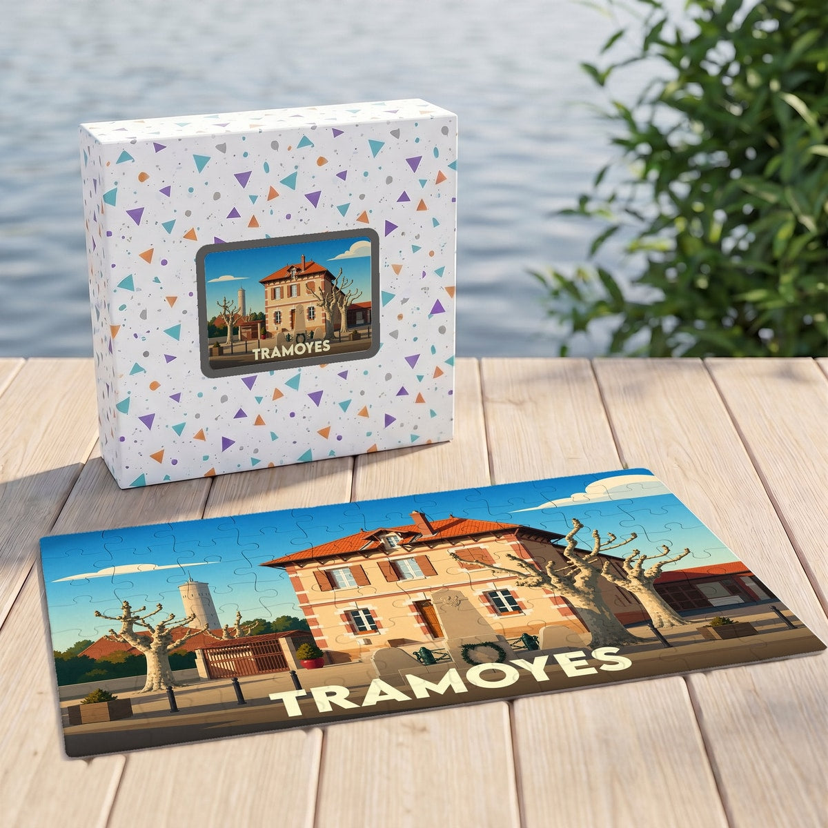 Puzzle souvenir de la ville de Tramoyes avec une illustration stylisée.