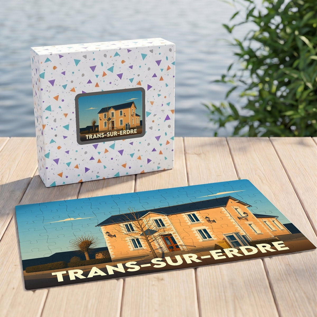 Puzzle souvenir de la ville de Trans-sur-Erdre avec une illustration stylisée d'un bâtiment local.