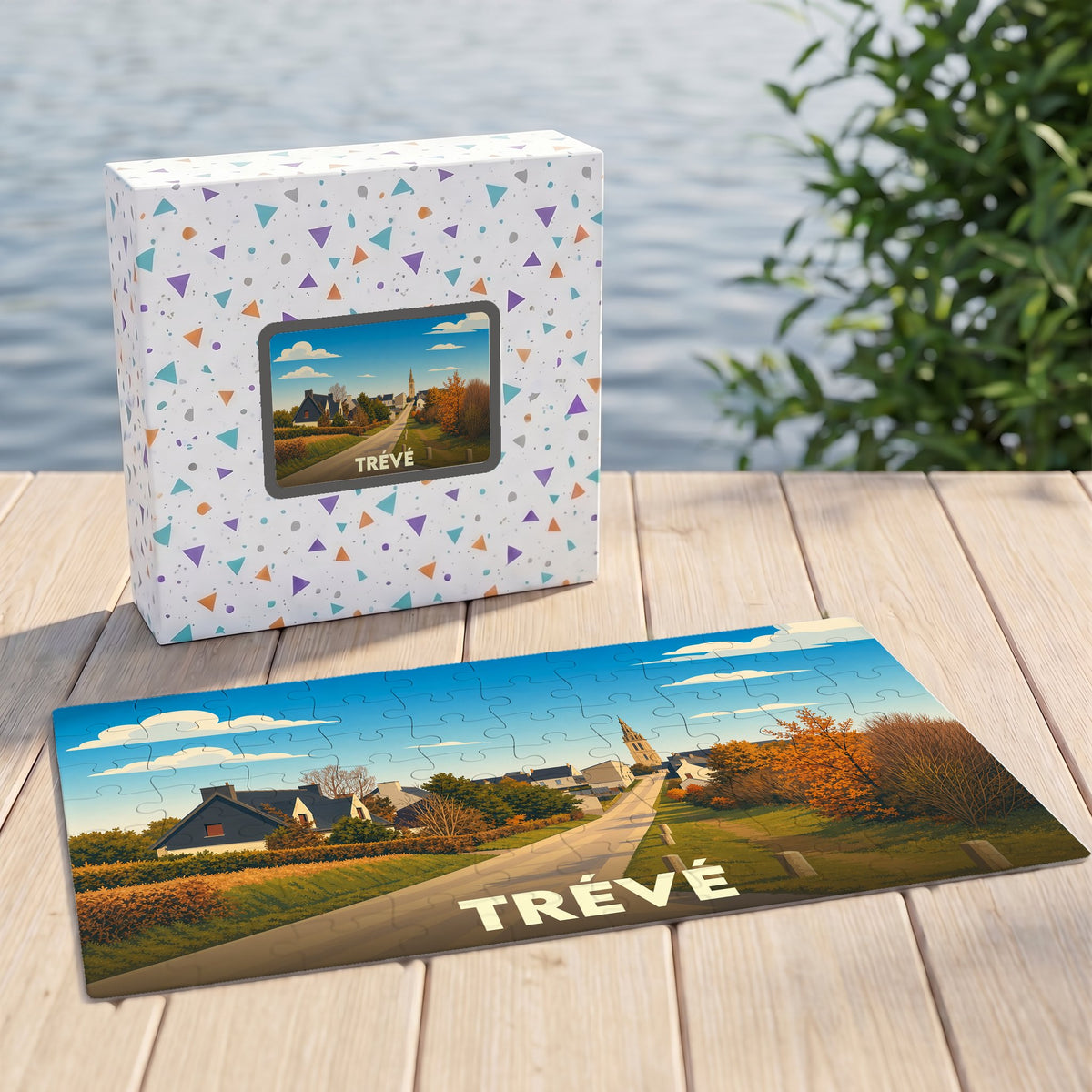 Puzzle souvenir de la ville de Trévé avec une illustration stylisée d'un paysage rural.