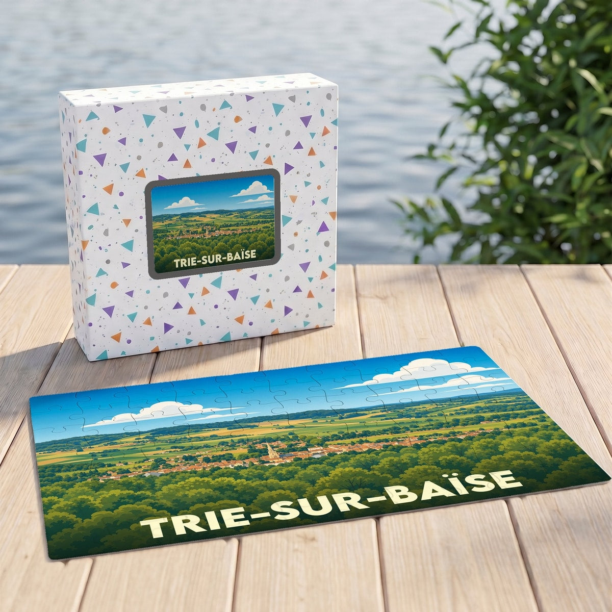 Puzzle souvenir de la ville de Trie-sur-Baïse avec une illustration paysagère stylisée.