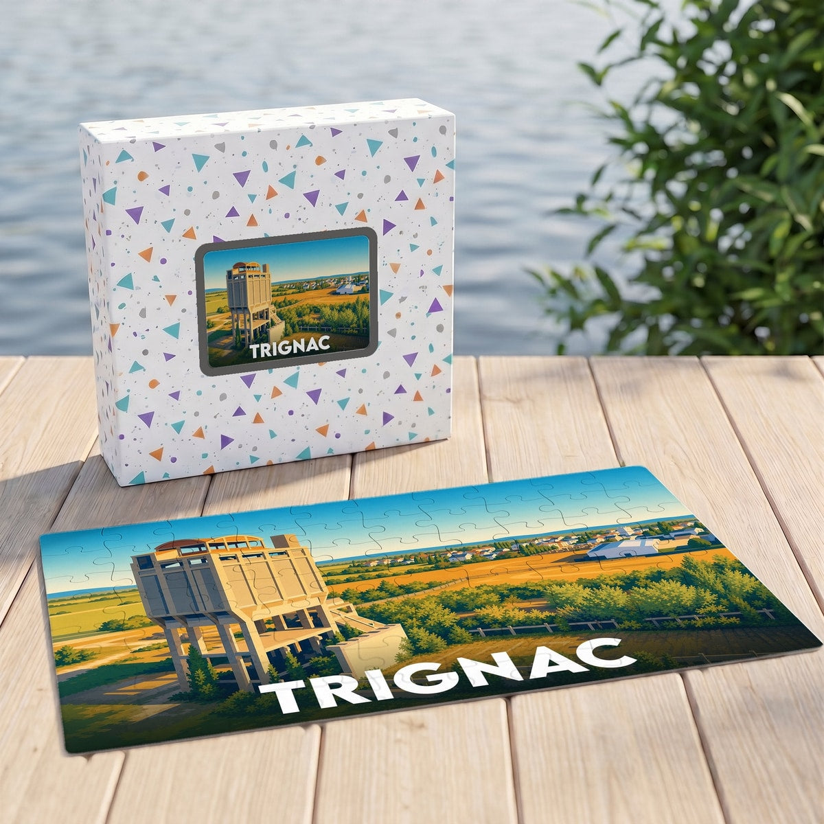 Puzzle souvenir de la ville de Trignac illustrant une vue paysagère avec une structure architecturale emblématique.