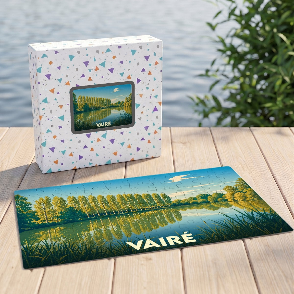 Puzzle souvenir de la ville de Vairé avec une illustration stylisée d'un paysage de bord d'eau.
