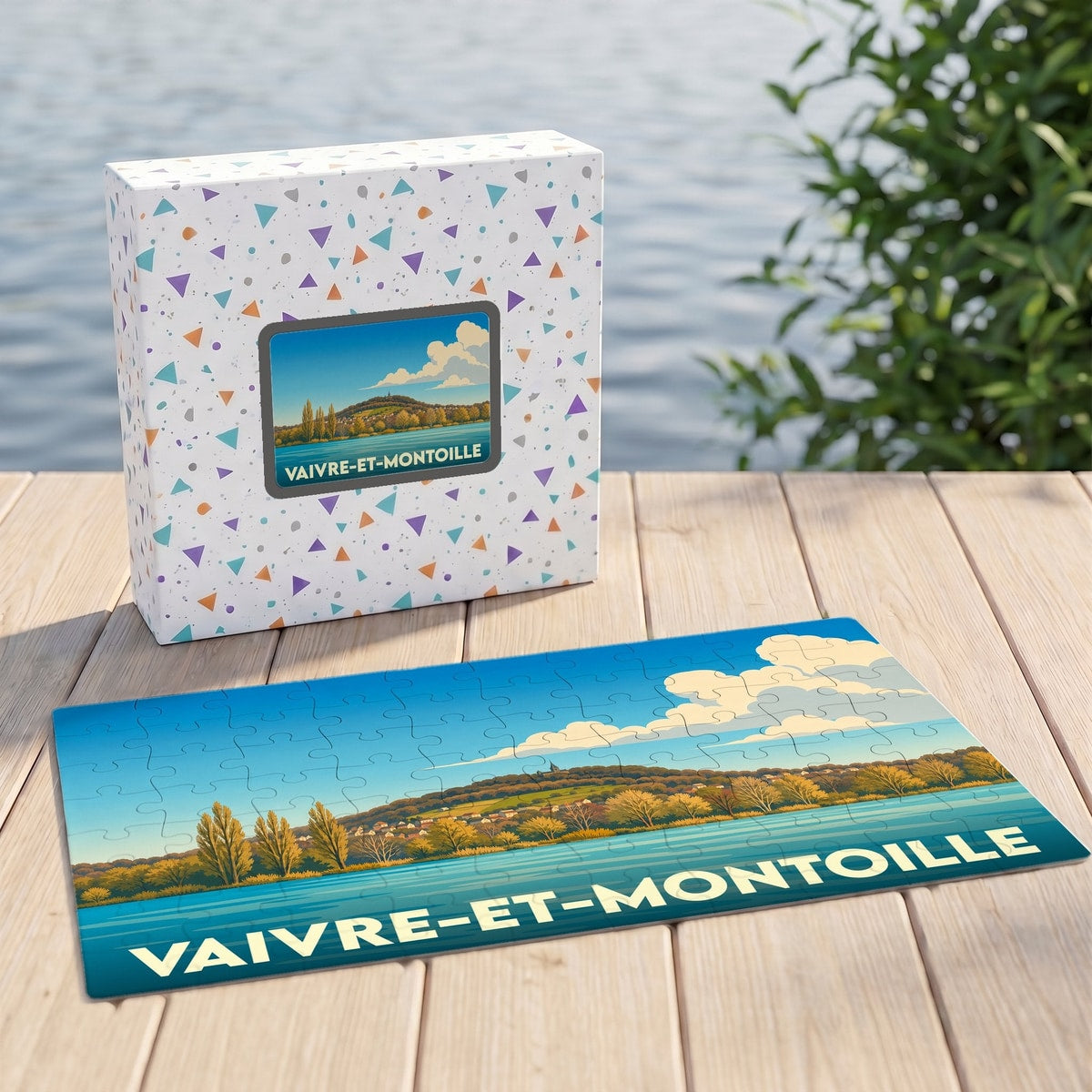 Puzzle souvenir de la ville de Vaivre-et-Montoille avec une illustration stylisée d'un paysage lacustre.