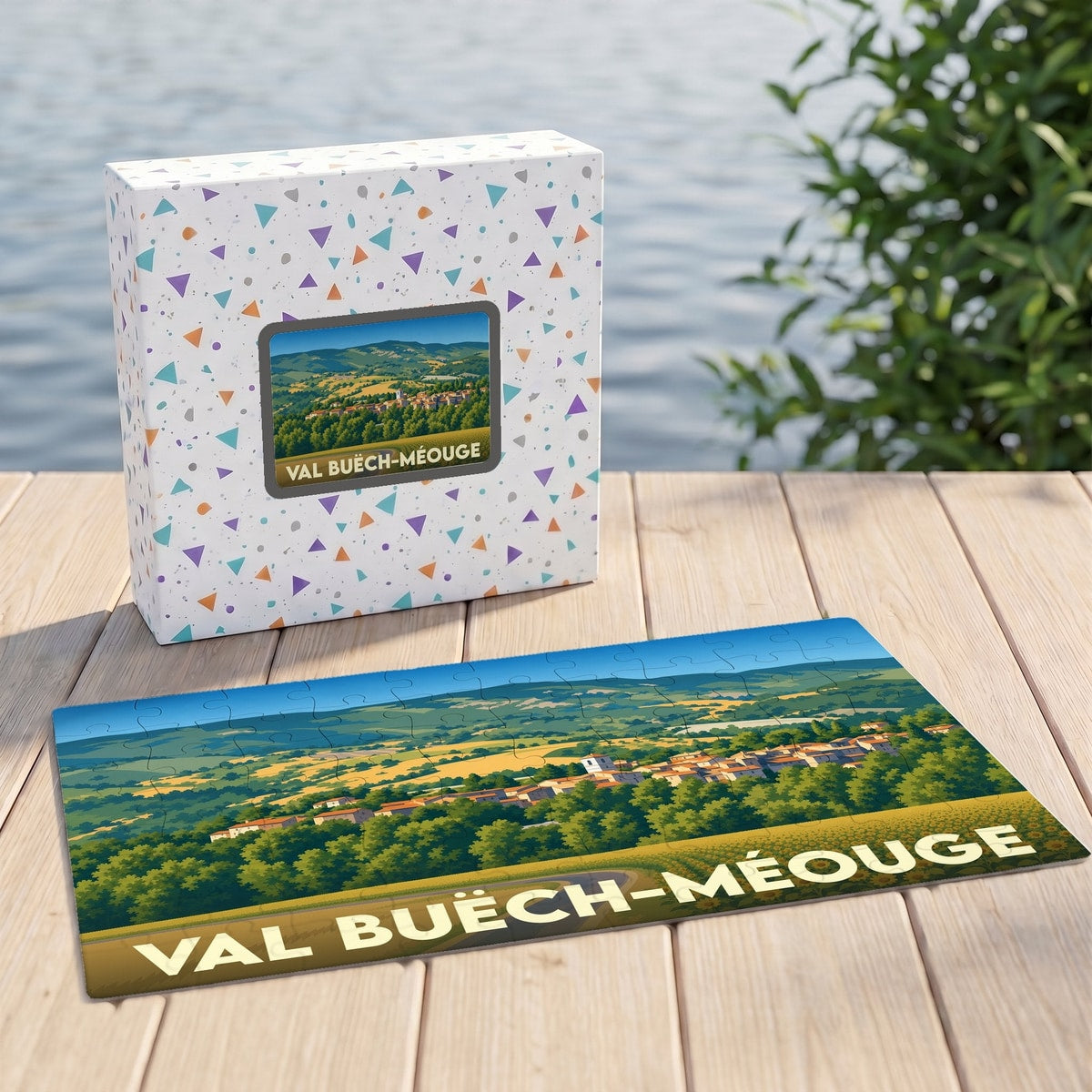 Puzzle souvenir de la commune de Val Buëch-Méouge avec une illustration paysagère stylisée.