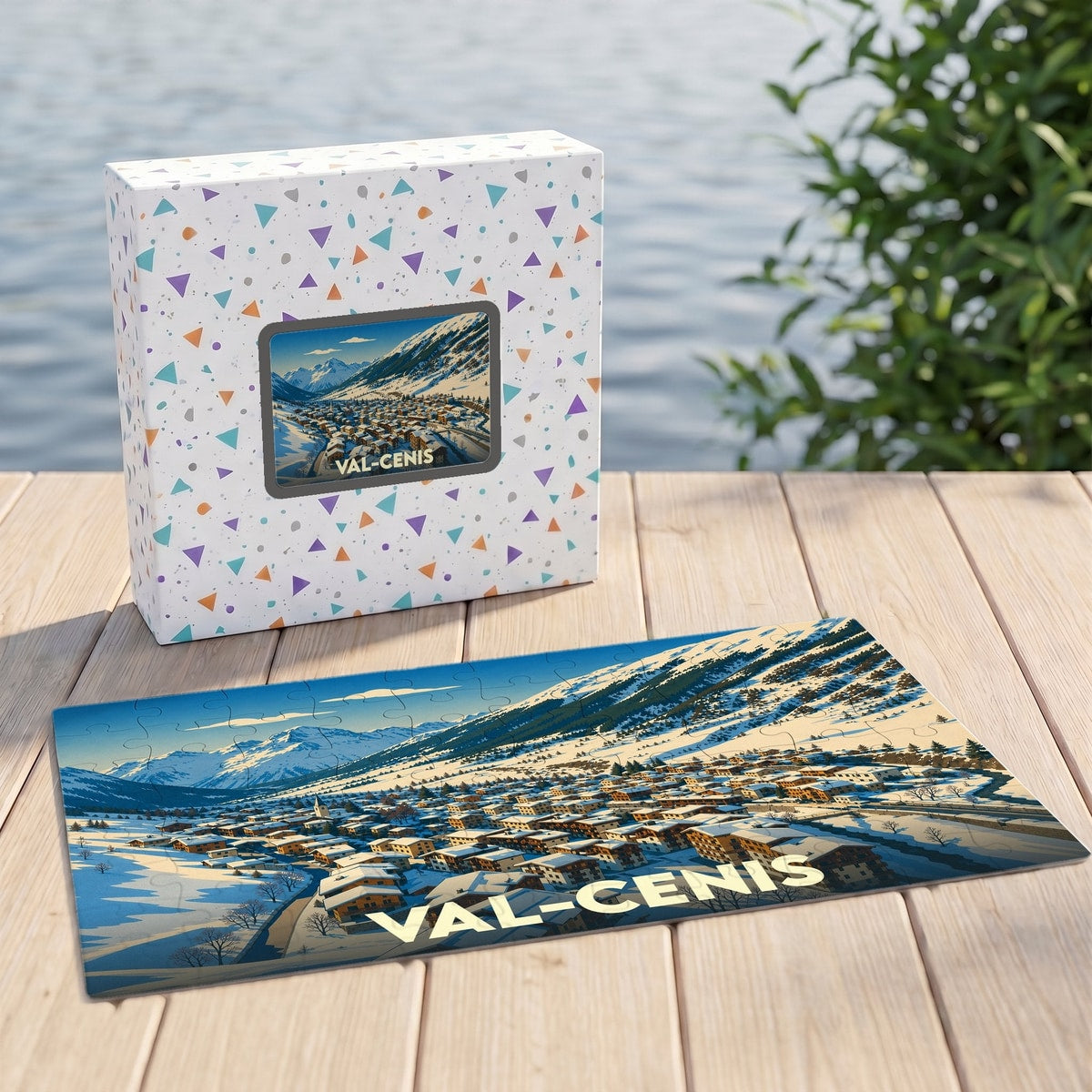 Puzzle souvenir de la ville de Val-Cenis représentant un village de montagne enneigé avec une illustration stylisée.