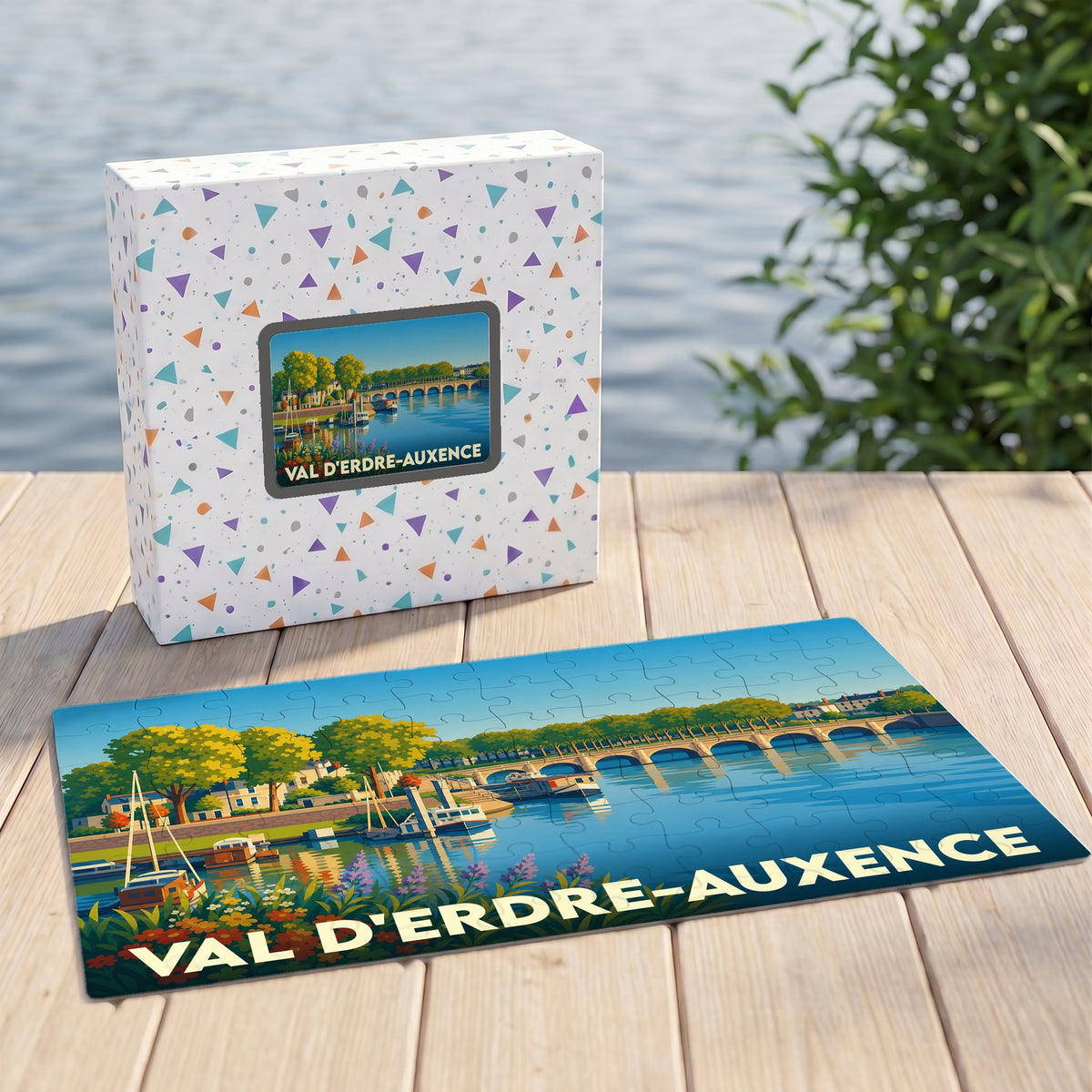 Puzzle souvenir de la ville de Val d'Erdre-Auxence avec une illustration stylisée des bords de l'Erdre.