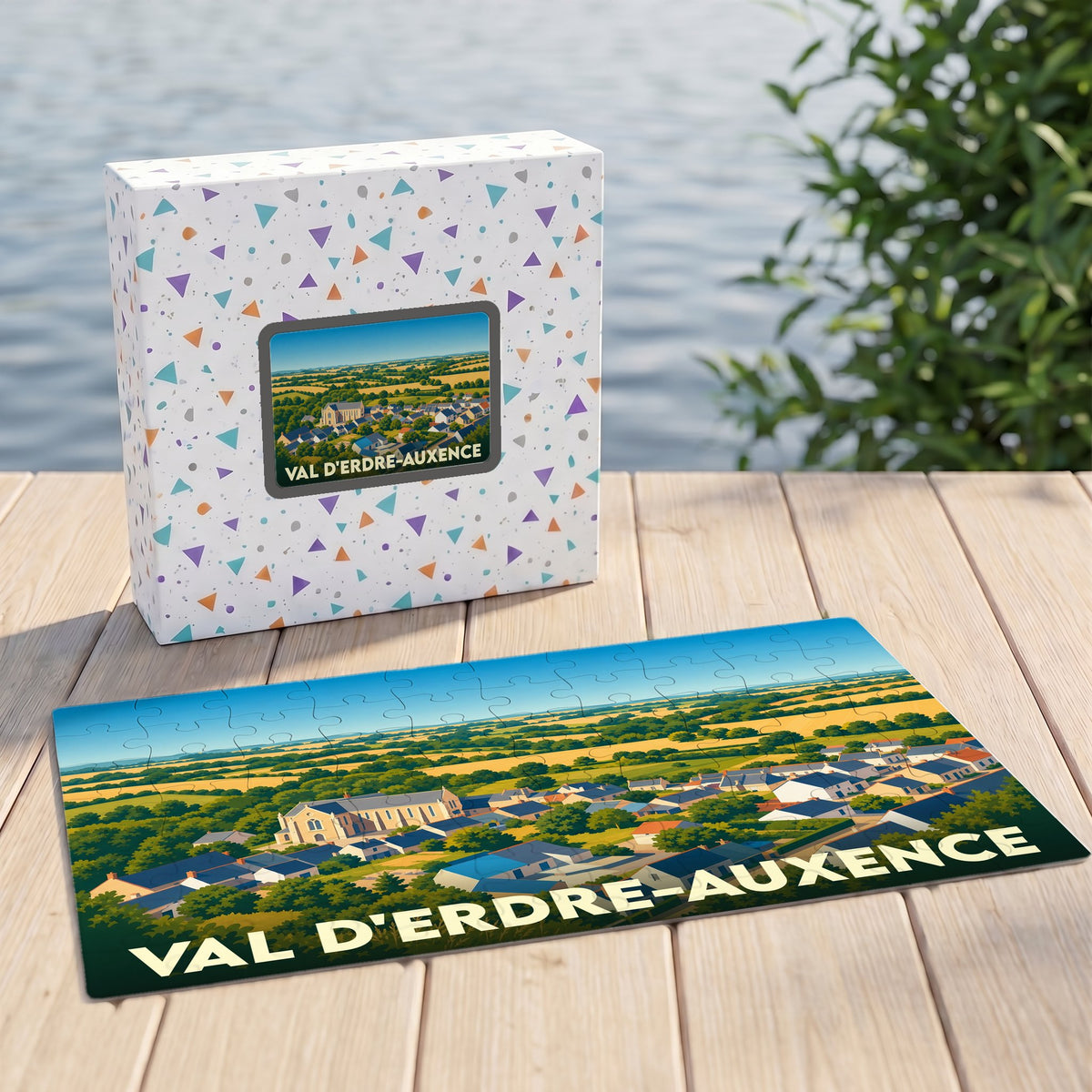 Puzzle souvenir de la ville de Val d'Erdre-Auxence avec une illustration panoramique stylisée.
