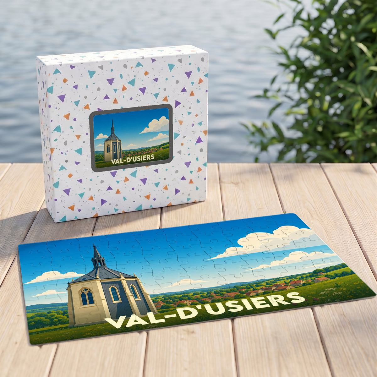 Puzzle souvenir de la ville de Val-d'Usiers avec une illustration stylisée d'une chapelle et de son paysage.