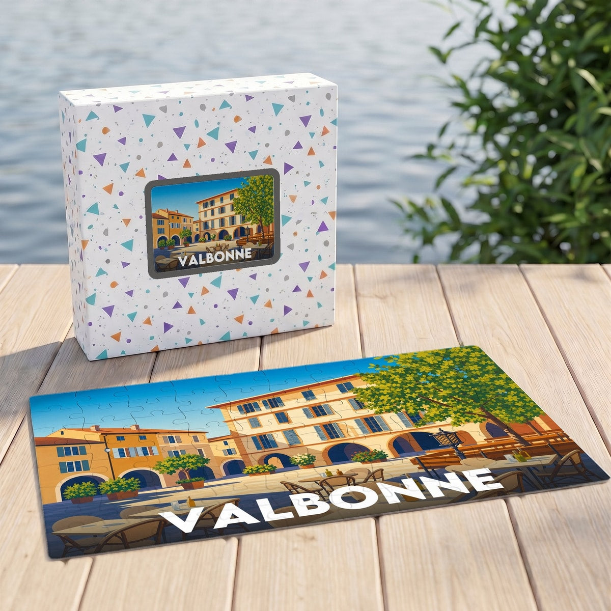 Puzzle souvenir de la ville de Valbonne avec une illustration colorée de sa place principale.