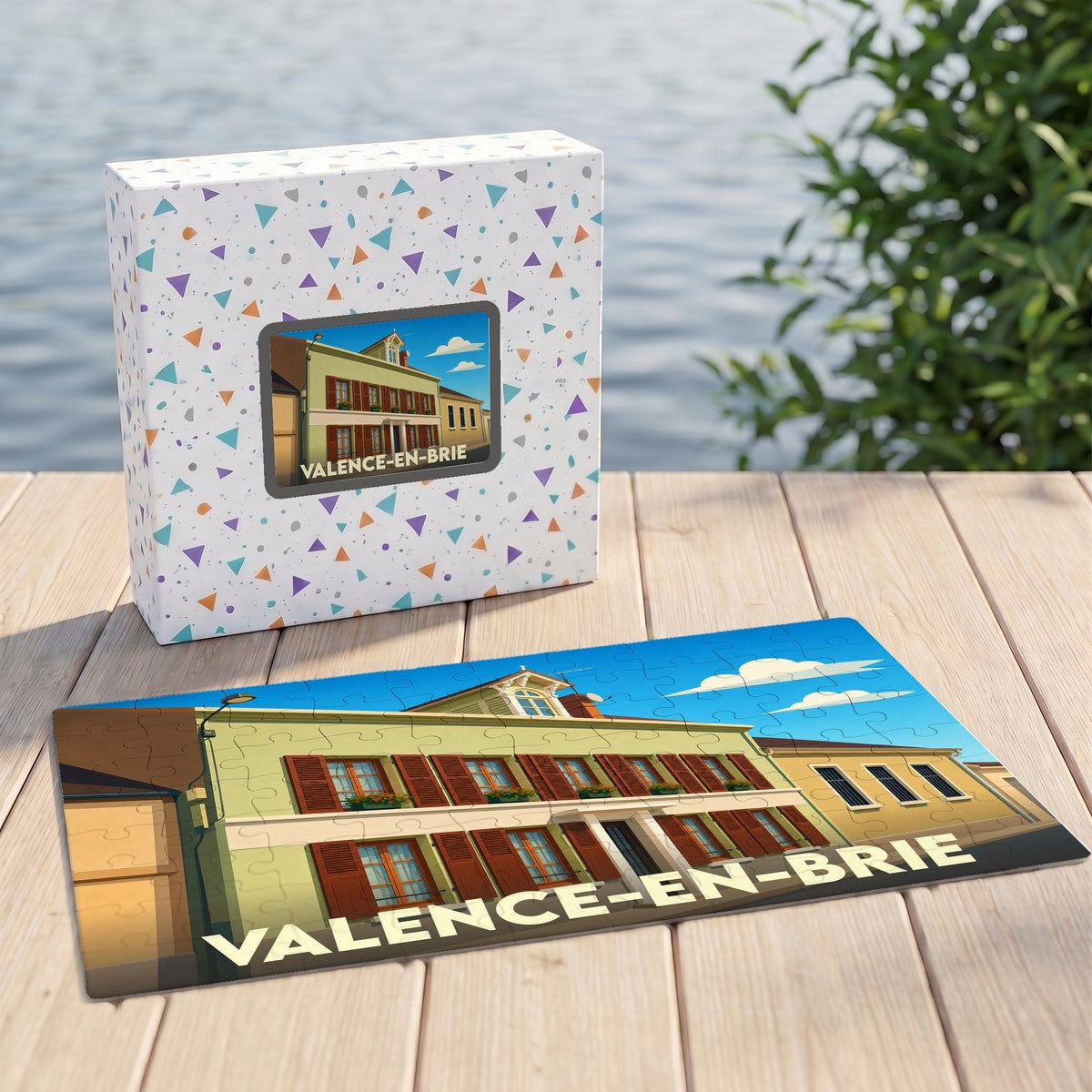 Puzzle souvenir de la ville de Valence-en-Brie avec une illustration stylisée d'une maison traditionnelle.
