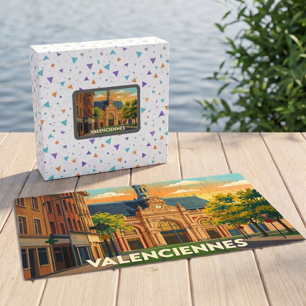 Puzzle souvenir de la ville de Valenciennes avec une illustration stylisée de sa gare au coucher du soleil.