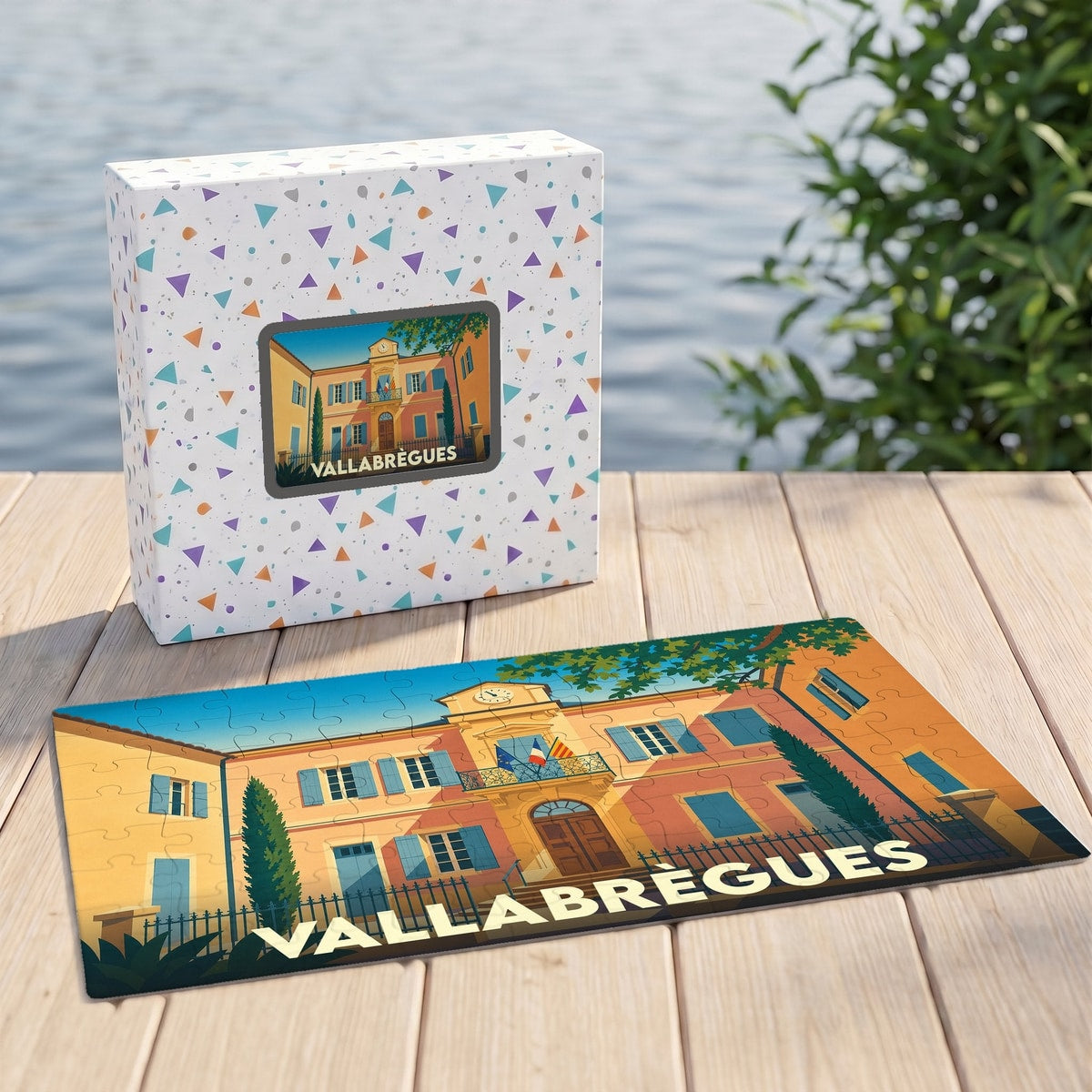 Puzzle souvenir de la ville de Vallabrègues avec une illustration stylisée et sa boîte assortie.