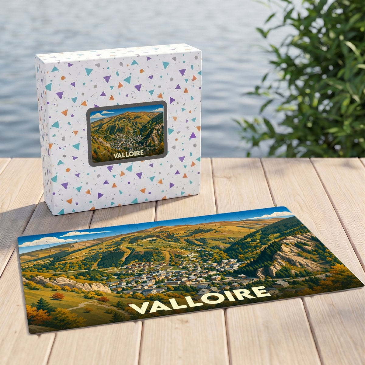 Puzzle souvenir de la ville de Valloire illustré d'un paysage montagneux stylisé.
