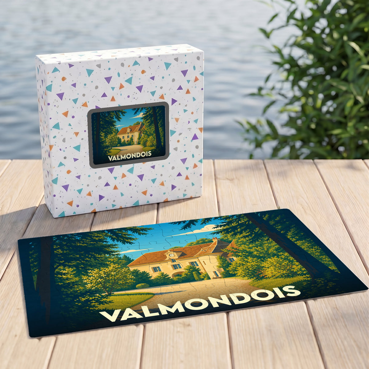 Puzzle souvenir de la ville de Valmondois avec une illustration stylisée d'une demeure bourgeoise nichée dans la verdure.