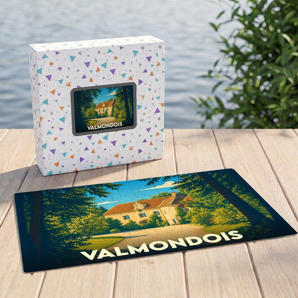 Puzzle souvenir de la ville de Valmondois avec une illustration stylisée d'une demeure bourgeoise nichée dans la verdure.