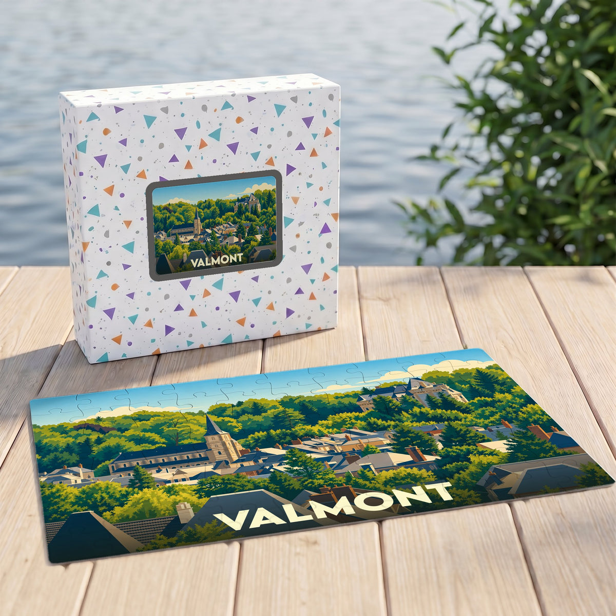 Puzzle souvenir de la ville de Valmont avec une illustration stylisée d'un paysage urbain verdoyant.
