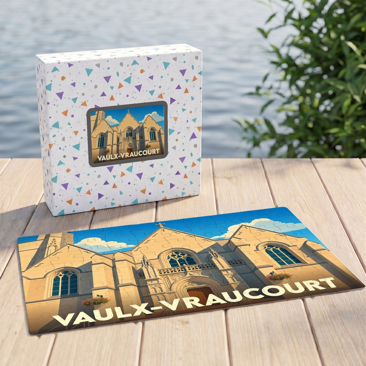 Puzzle souvenir de la ville de Vaulx-Vraucourt avec une illustration stylisée de l'église locale.