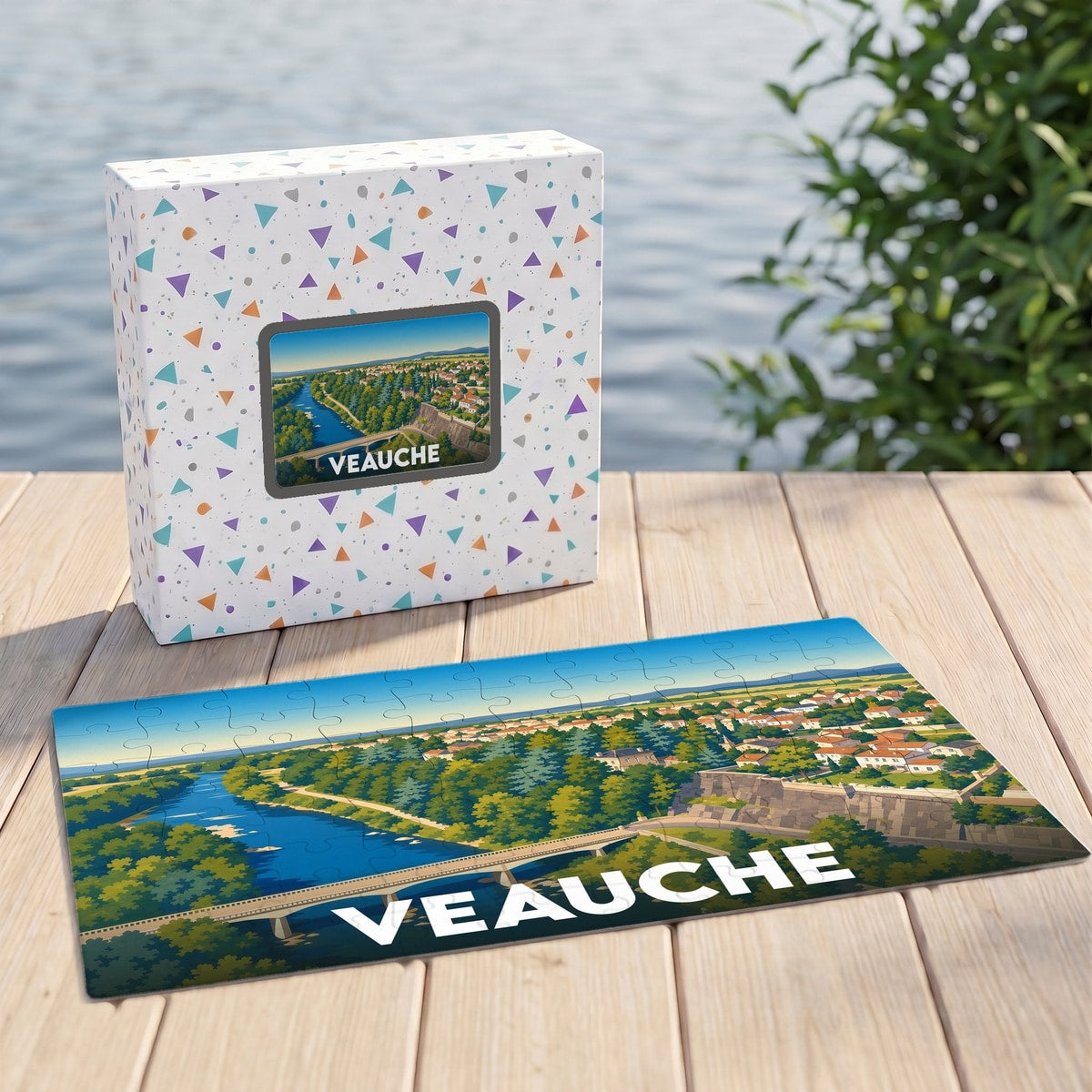 Puzzle souvenir de la ville de Veauche avec une illustration stylisée d'un paysage fluvial et urbain.