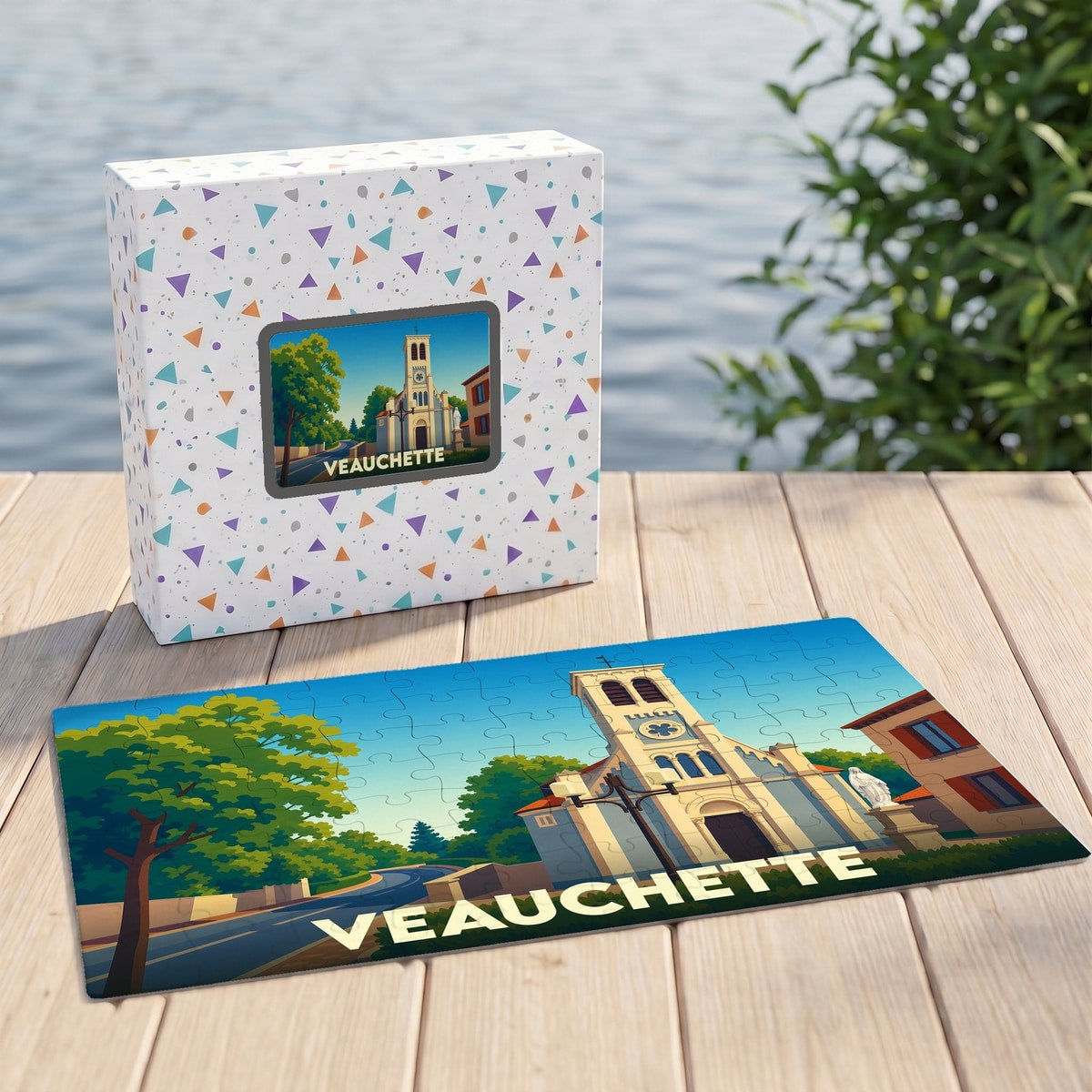 Puzzle souvenir de la ville de Veauchette avec une illustration stylisée de son église.