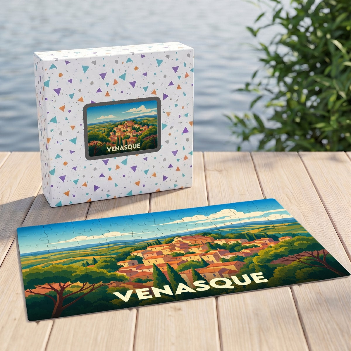 Puzzle souvenir de la ville de Venasque illustré d'un paysage provençal stylisé.