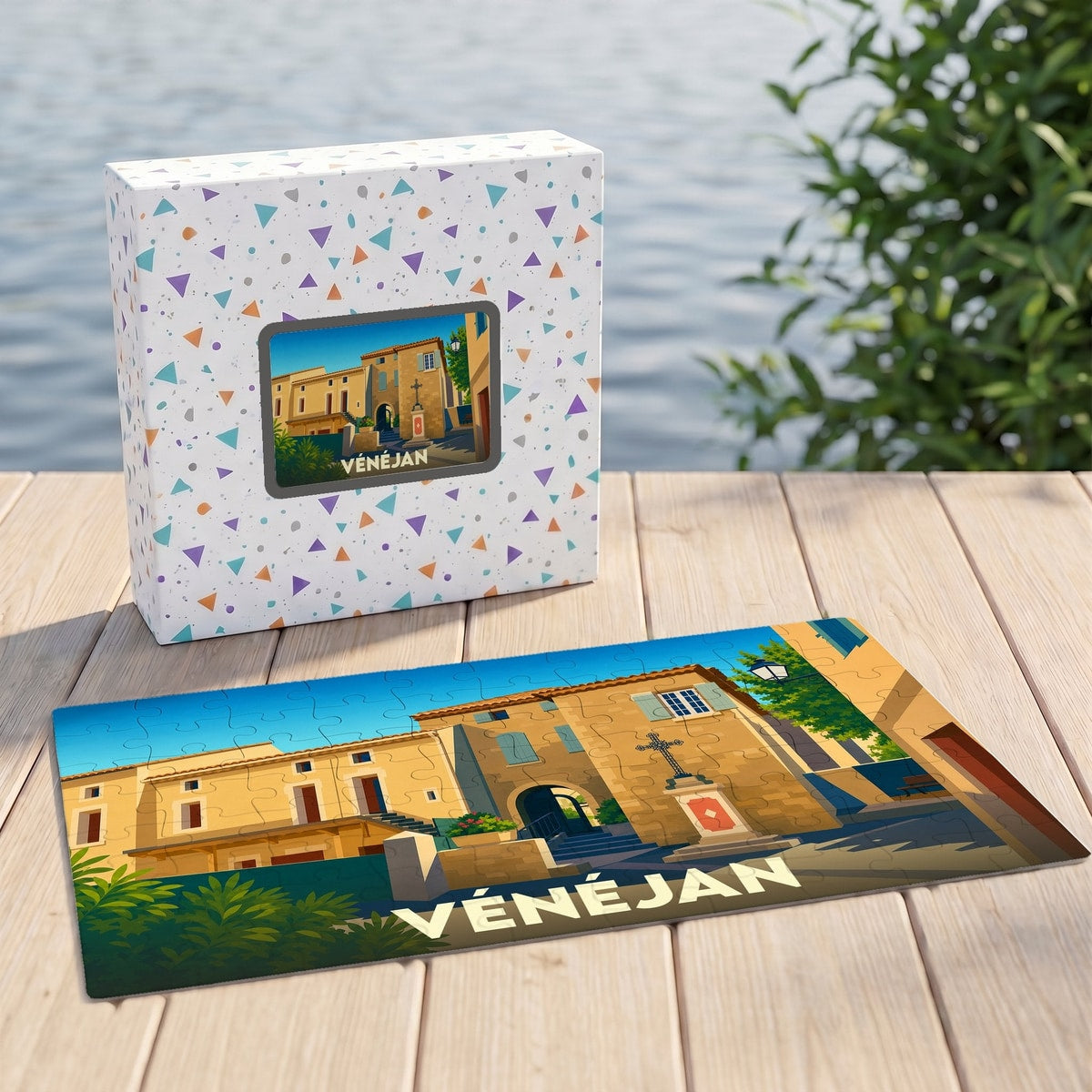 Puzzle souvenir de la ville de Vénéjan avec une illustration stylisée et sa boîte assortie.