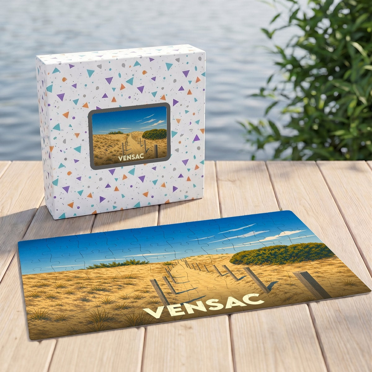 Puzzle souvenir de la ville de Vensac illustrant un chemin de sable vers les dunes.