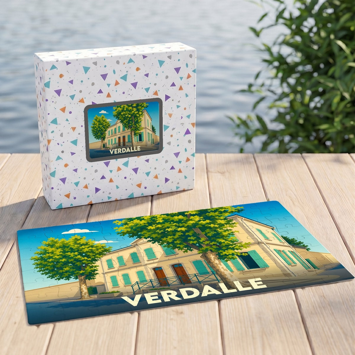 Puzzle souvenir de la ville de Verdalle avec une illustration stylisée d'un bâtiment arboré.