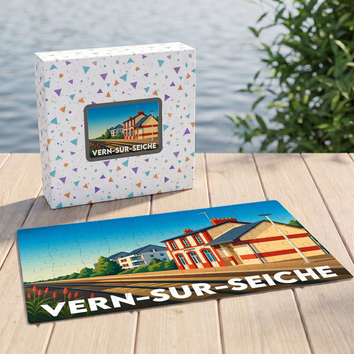 Puzzle souvenir de la ville de Vern-sur-Seiche illustré d'une gare stylisée et de son carton d'emballage.
