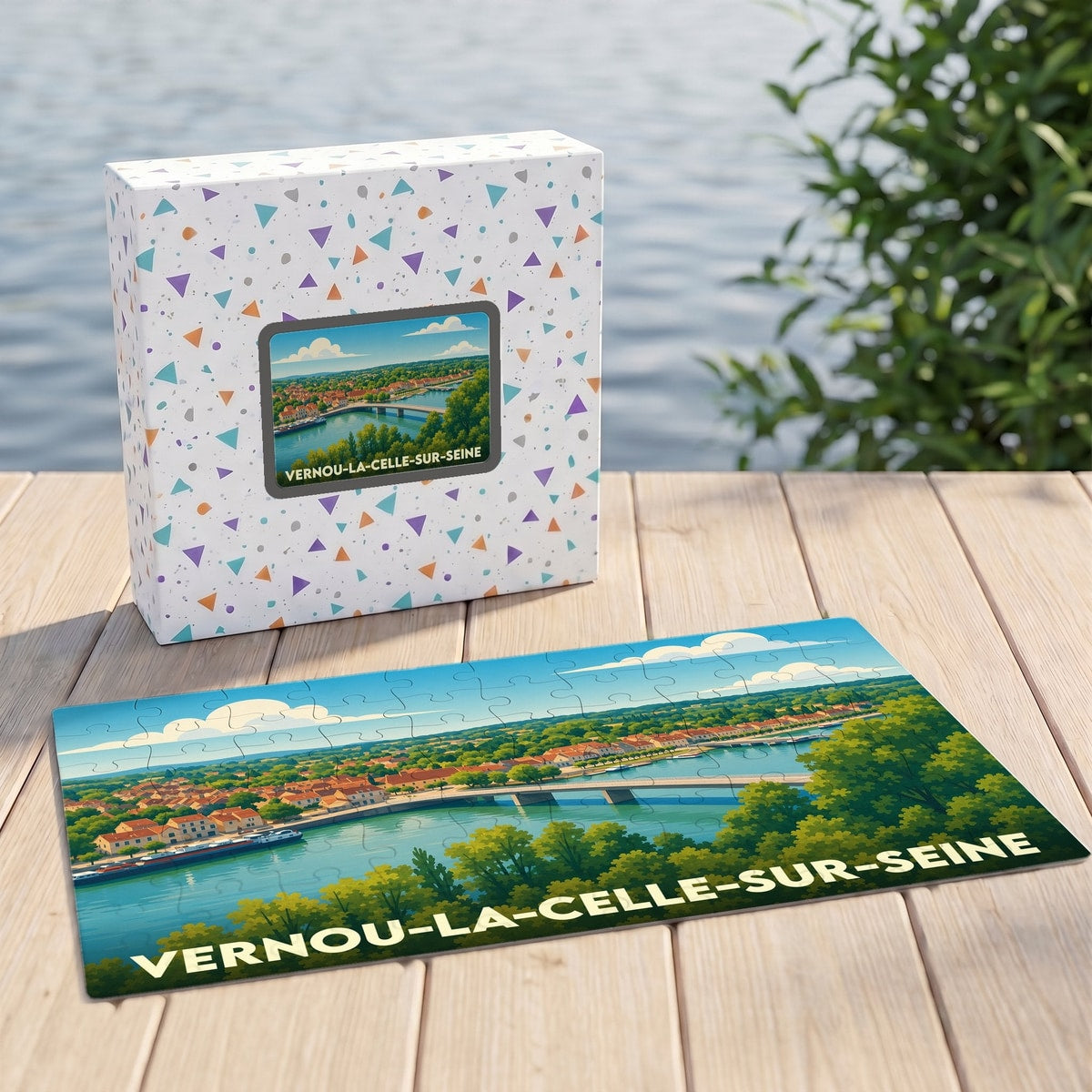 Puzzle souvenir de la ville de Vernou-la-Celle-sur-Seine avec une illustration stylisée d'un pont enjambant le fleuve.