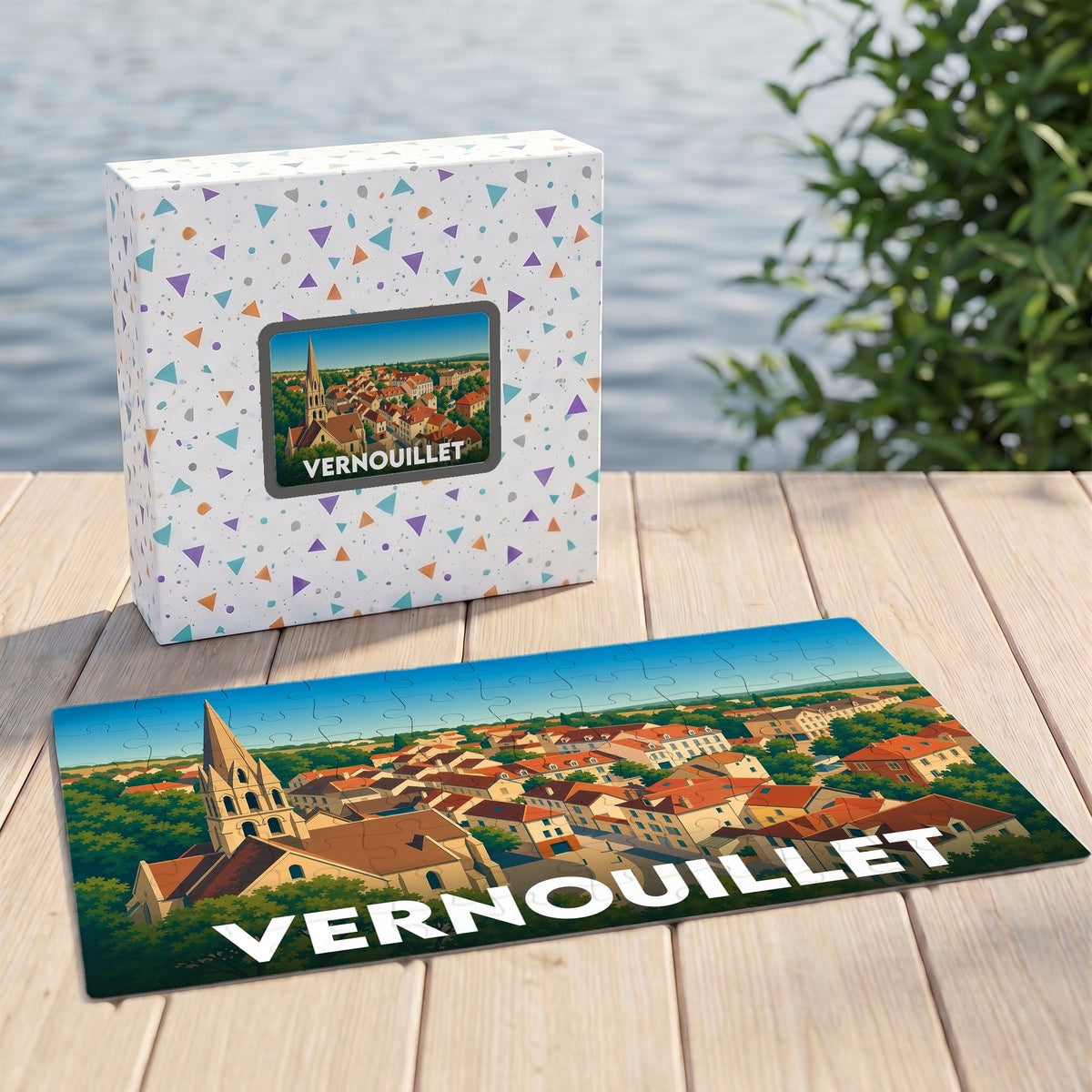 Puzzle souvenir de la ville de Vernouillet avec une illustration panoramique stylisée.