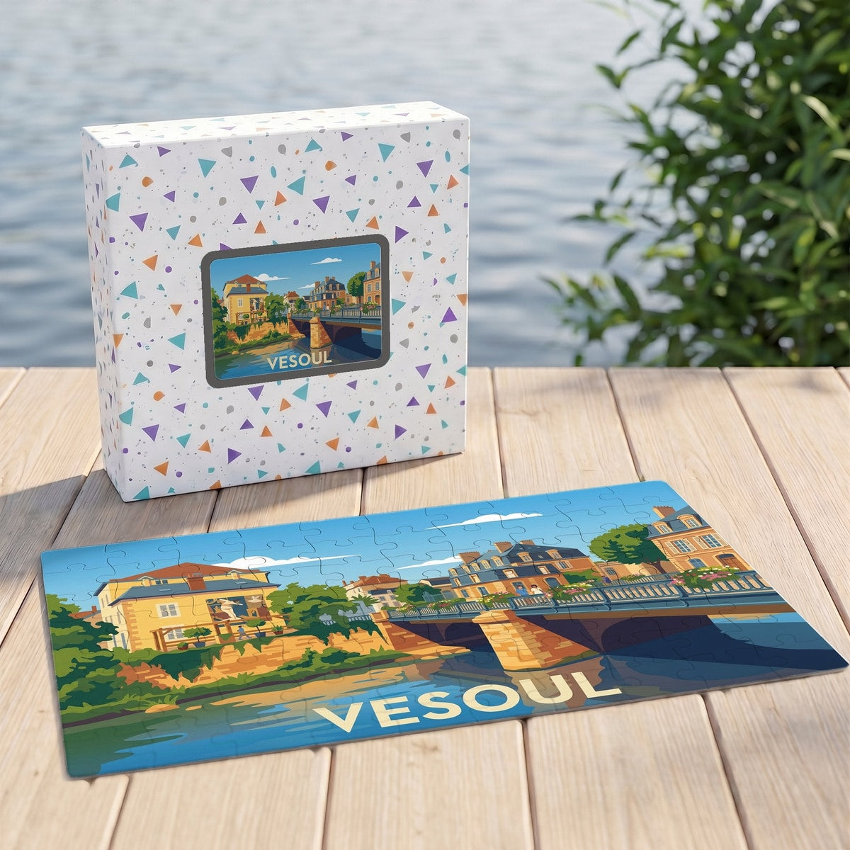 Puzzle souvenir de la ville de Vesoul avec une illustration colorée et stylisée représentant un pont sur une rivière.