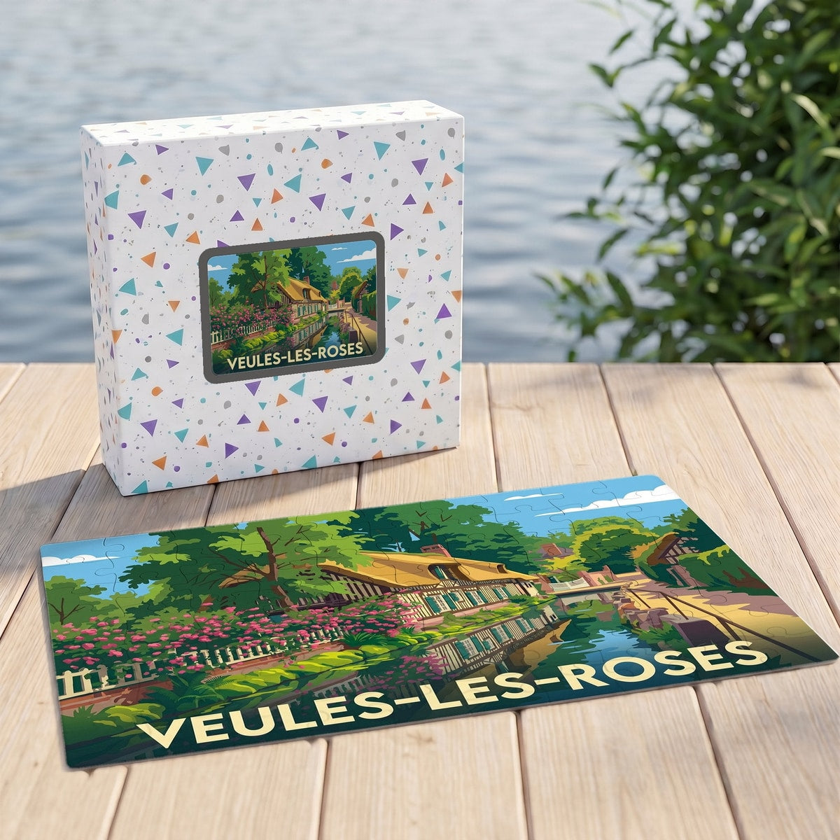 Puzzle souvenir de la ville de Veules-les-Roses avec une illustration stylisée et colorée de ses chaumières au bord de l'eau.