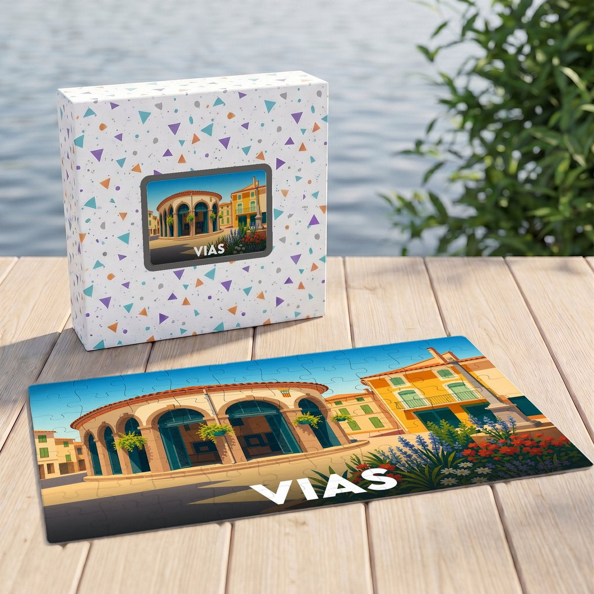 Puzzle souvenir de la ville de Vias illustrant un bâtiment historique coloré sous forme de dessin stylisé.