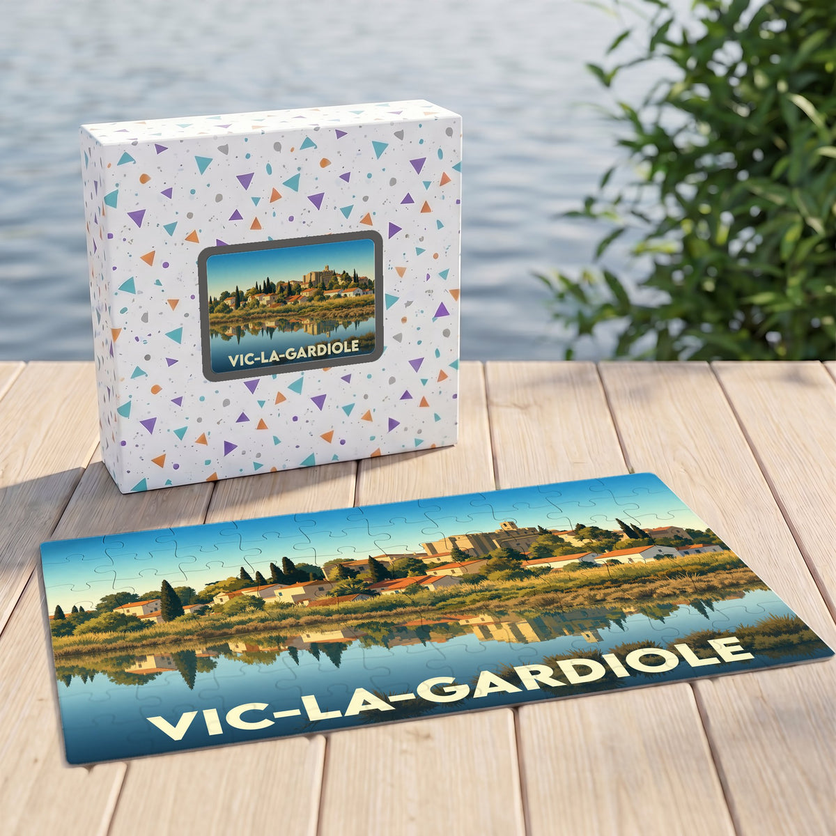 Puzzle souvenir de la ville de Vic-la-Gardiole avec une illustration stylisée et colorée.